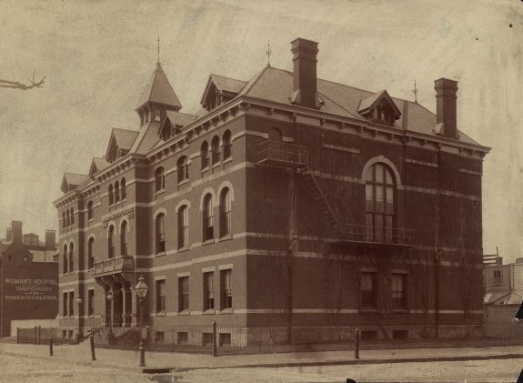 Old picture of a brown brick building. This building is the old and original female medical college in Pennsylvania.