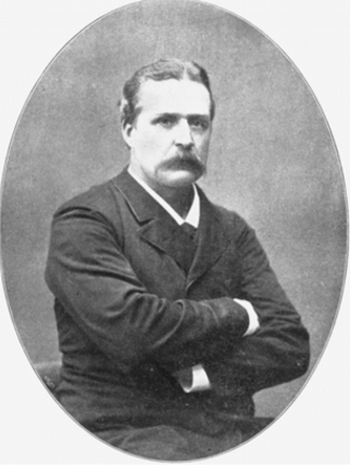 Black-and-white portrait of a mustachioed Hjalmar Stolpe; he is wearing a dark suit and his arms are crossed. His expression is serious.