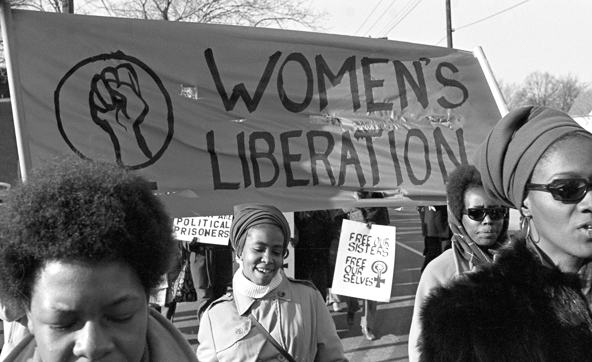 Alt text: Black women marching for their liberation